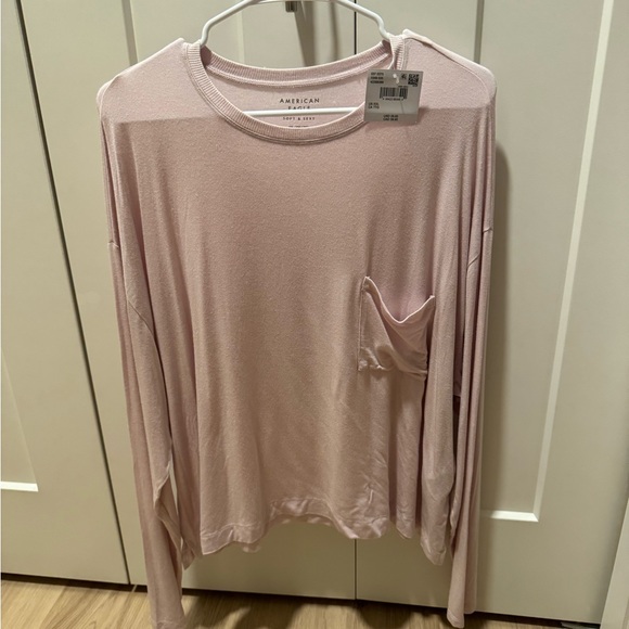 American Eagle Outfitters Tops - American Eagle Outfitters Soft and Sexy Light Pink Long Sleeve Tee Pocket NWT